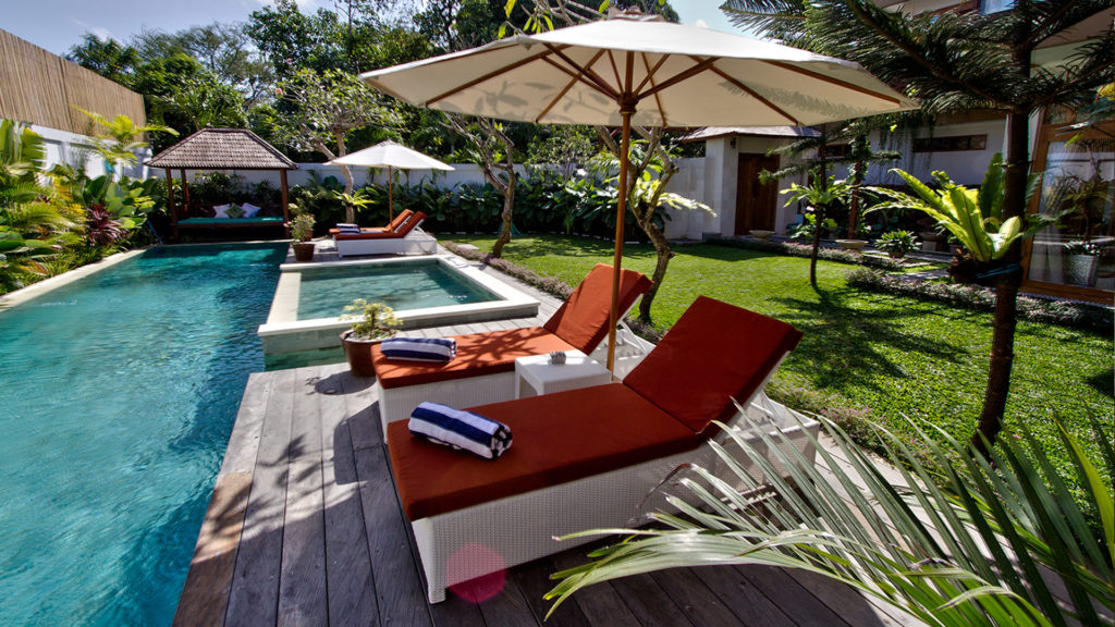 Lush garden beside the pool at Zolina Villa